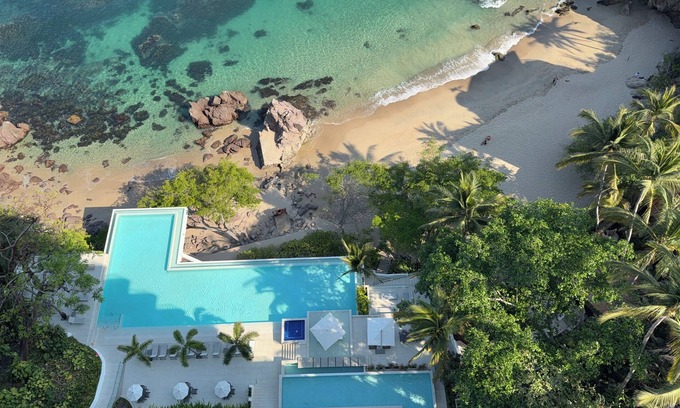 Amapas Apartment | Oceanfront Bliss: 3 BR Sayan Beach Condo with Incredible Amenities