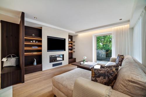 Schenna Apartment | Experience Comfort at Schenna Chalet - Apt Dora with Hot Tub