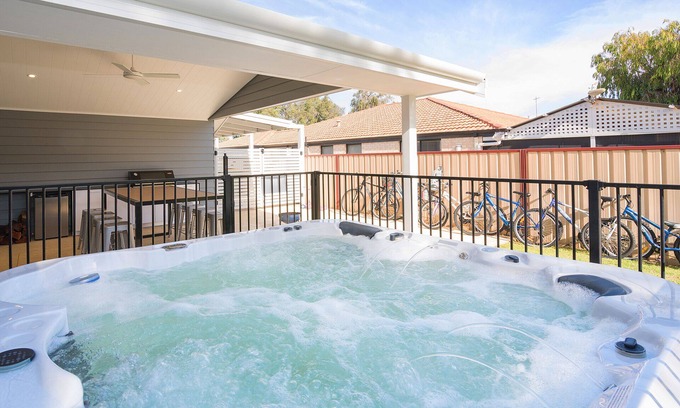 Broadwater House | Beachside Family Haven with Ocean View & Pool Access