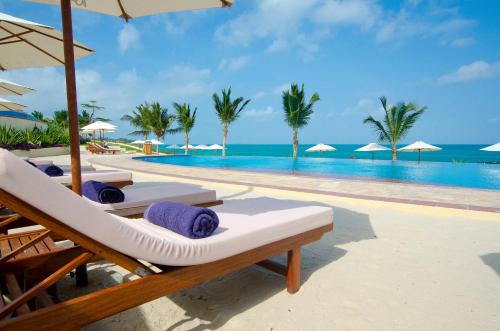 Mangapwani Resort | Serene Sea Cliff Resort & Spa: Oceanfront Retreat Awaits