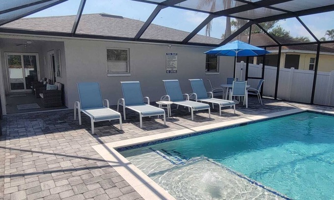 Naples Park House | Beachside Retreat: Unmatched Comfort Near Shops & Dining