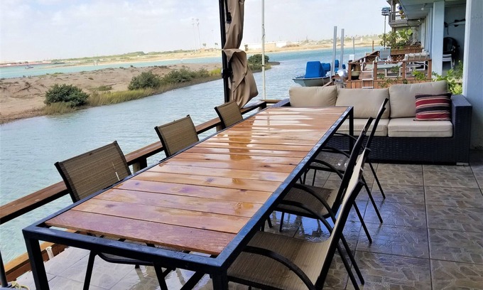 Port Isabel Cottage | Sea Cottage: Oceanfront Retreat with Boat Access & Spa