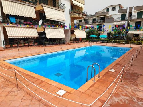 Sant'Anna Apartment | Sea Garden: Oceanfront Paradise with Pool & Pet-Friendly