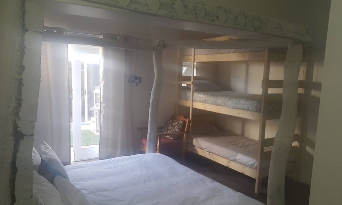 Strand House | Beachside Retreat for 11 with Kitchen & Breakfast Included