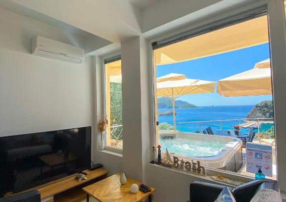 Lakones Apartment | Oceanfront Sea La Vie Apt. with Hot Tub and High Rating