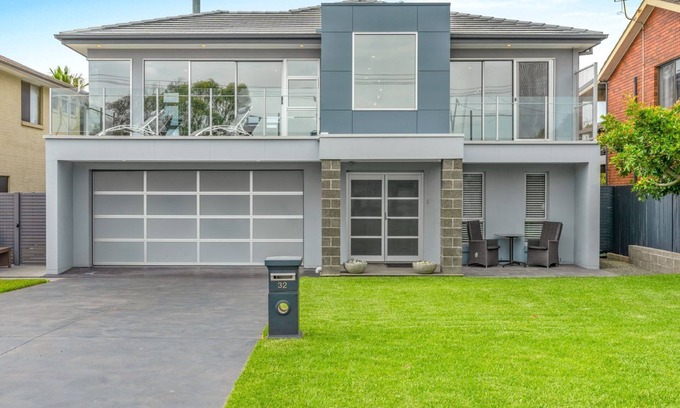 Culburra Beach House | Sea La Vie: Pet Friendly Retreat with Pool and Spa Access
