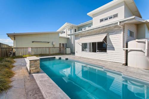 Stockton House | Tranquil Escape at Stockton: Poolside Family Retreat