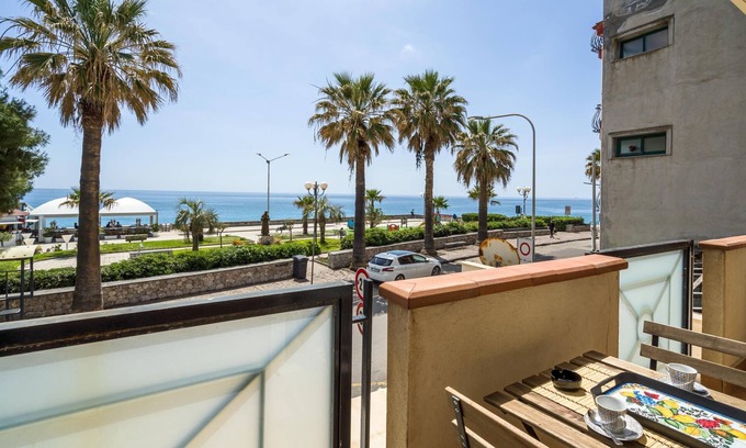 Mazzeo Apartment | Beachside Retreat: Sea View Apartment Just Steps from Ocean