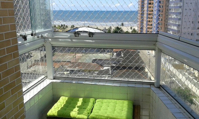 Aviacao Apartment | Inviting Sea-View Apartment with Pool & Balcony in Praia Grande