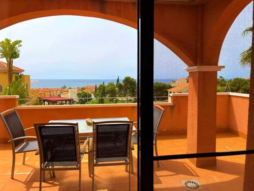 Los Puertos Apartment | Elegant Sea View Apartment with Garden at Mojon Hills