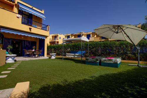Costa Meloneras Apartment | Serene Sea View Duplex with Pool, Hot Tub & Barbecue