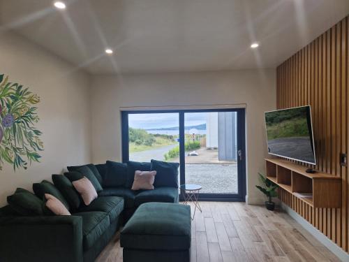 Buncrana Apartment | Oceanfront Sea View Studio - Rated 9.5 by Guests