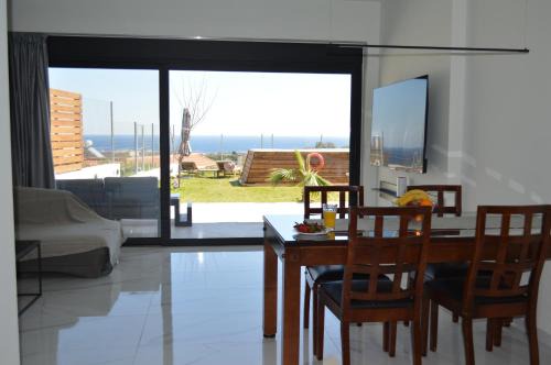 Petaloudes Apartment | Oceanfront Sea View Sunrise Apartment for Memorable Getaways