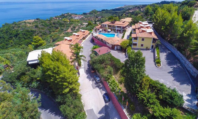 Xirokastello Apartment | Beachfront Bliss at Sea View Village - 4-Star Comfort