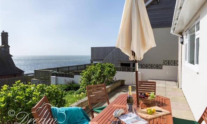 West Bay House | Beachfront Seacliff: Pet-Friendly with Ocean Views