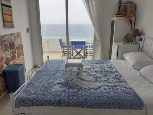 Arkasa Apartment | Serene Seafront Aegean Nest: Family-Friendly Retreat