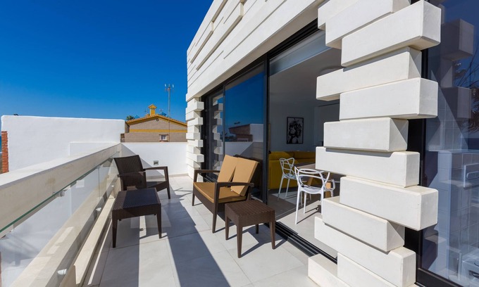 La Cala del Moral Apartment | Relaxing Seafront Calabeach with Spa and Ocean Views
