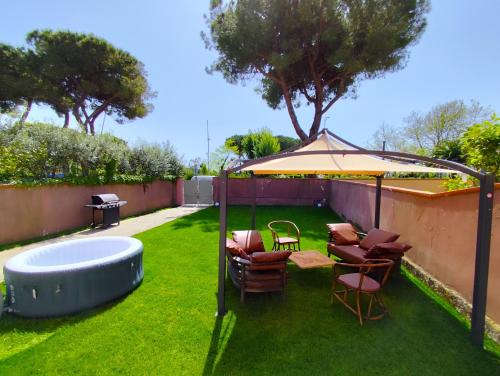 Marina di Carrara Apartment | Oceanfront Deluxe Retreat with Private Jacuzzi & Garden