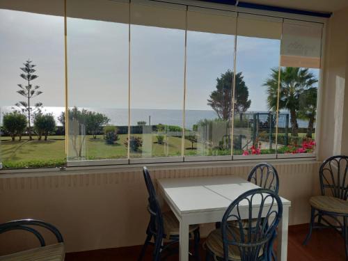 Torrox Costa Apartment | Seafront Retreat with Garden and Ocean Views Await You