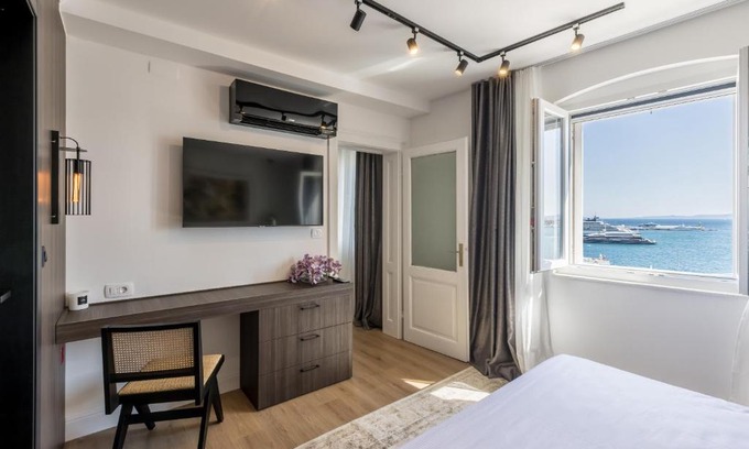 Old Town Apartment | Oceanfront Retreat: Seafront Apartment Pere for Families