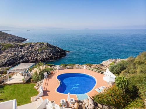 Stavros Villa | Seafront Villa Shore: Oceanfront Bliss with Top Reviews
