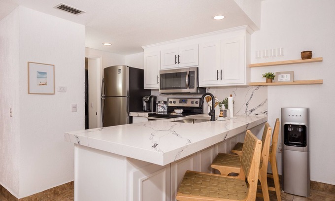 Sandy Beach Condo | Cozy Seaside Bungalow B101 with Pool and Ocean View