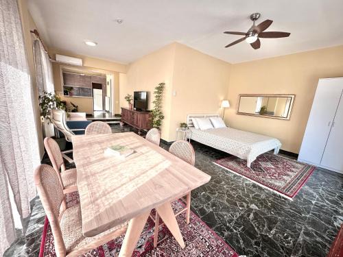 Olymbiaki Akti Apartment | Oceanfront Family Home with Beautiful Wraparound Balcony