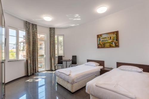 Burgas Center House | Cozy SeaSide Guest Rooms with Family-Friendly Amenities