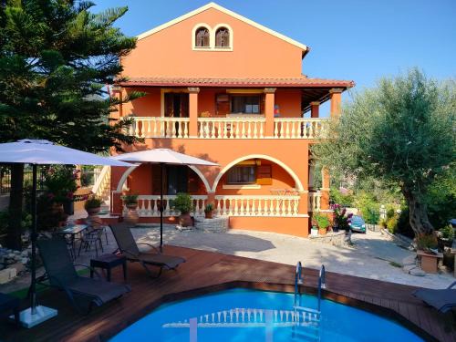 Agia Pelagia Chlomou Apartment | Beautiful Seaside Pool Villa with Oceanfront Views