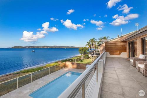 Salamander Bay House | Waterfront Haven: Family-Friendly Home with Heated Pool