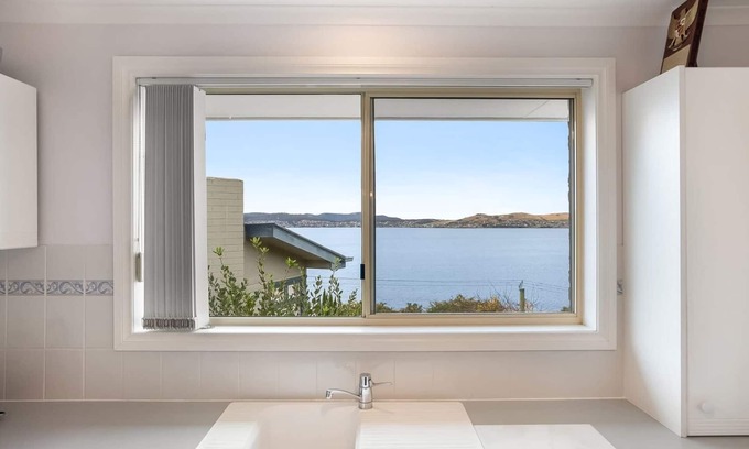 Sandy Bay House | Seaside Serenity: Oceanfront Retreat with Family Amenities