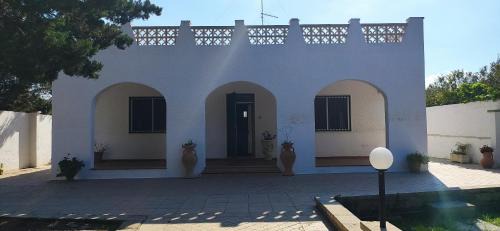 Giorgilorio Villa | Idyllic Seaside Villa with Hot Tub, Steps from the Beach
