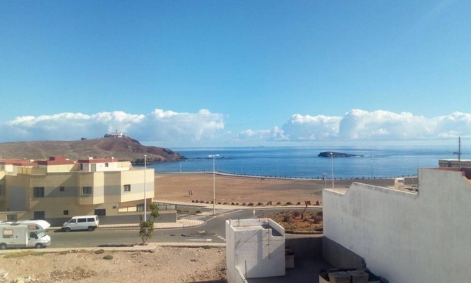 Playa de Arinaga Apartment | Seaview Faro Arinaga: Pet Friendly with Pool & Breakfast
