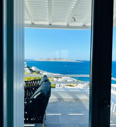 Agios Stefanos Apartment | Indulgent Seaview Residence with Hot Tub for Families