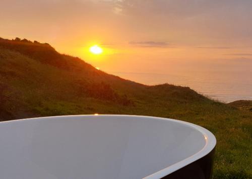 Otaua House | Seaside Escape - Breathtaking Ocean Views & Relaxing Bath