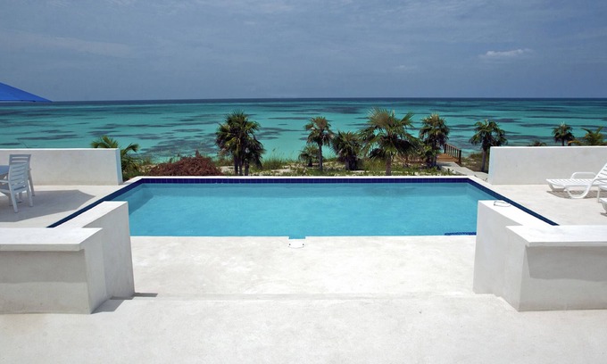 North Palmetto Point House | Seaview Villa: Beachfront Home with Ocean View & Pool