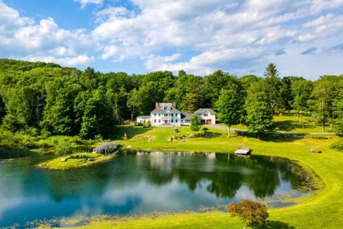 Austerlitz House | Secluded Sunny Pond Estate with Private Gym & Theater