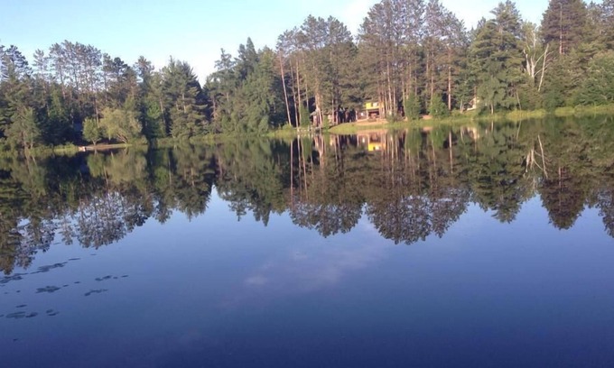 Gwinn Cabin | Secluded lake cabin on 2 acres with swimming beach, dock & sauna, new roof
