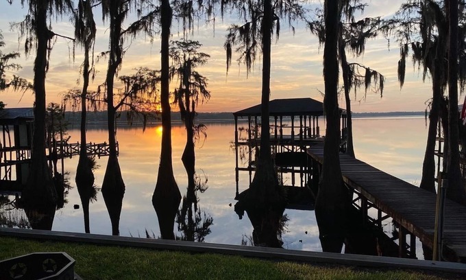 Clermont House | Lakefront Retreat with Dock, Spa & Hot Tub Near Disney