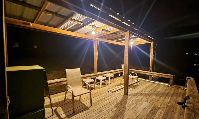 Yantis Cabin | Tranquil Lakefront Cabin with Pool & Private Boat Ramp