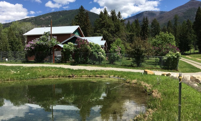 Fortine Cabin | Idyllic Rocky Mountain Log Cabin with Lake & Ocean Views