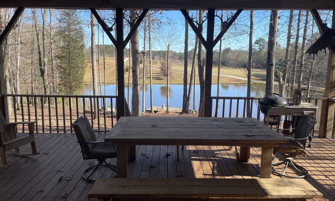 Woodville Cabin | Private Cabin Oasis Over a Stocked Pond with Pet-Friendly Amenities