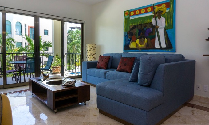 Playacar Fase I Condo | Experience Garden and Pool Views at Paseo del Sol by BRIC