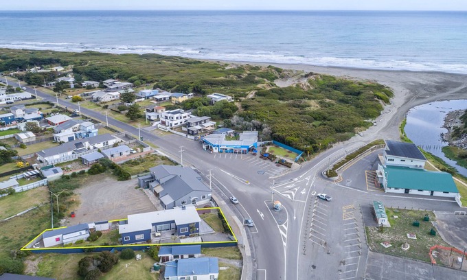 Himatangi Beach House | Experience Oceanfront Bliss with Surf Views and Pet Welcome