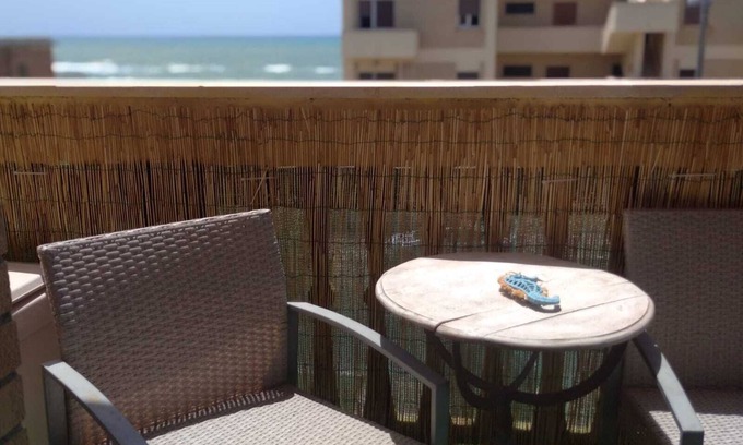 Torvaianica Apartment | Seefront Central: Pet-Free Retreat with Breakfast Included