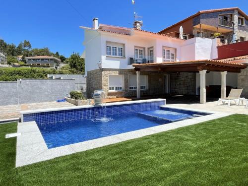 Sanxenxo House | Exceptional Views and Poolside Relaxation at Seixalbo26