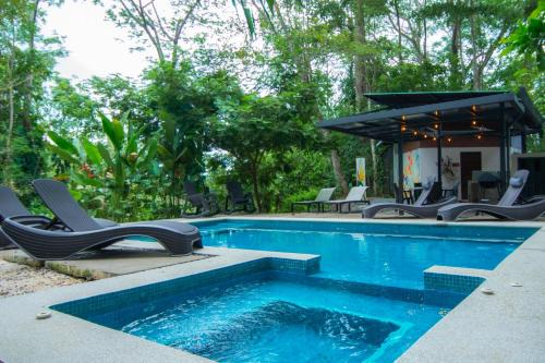 Tarcoles Cabin | EcoLodge Escape: Selva Color with Pool & Ocean Views