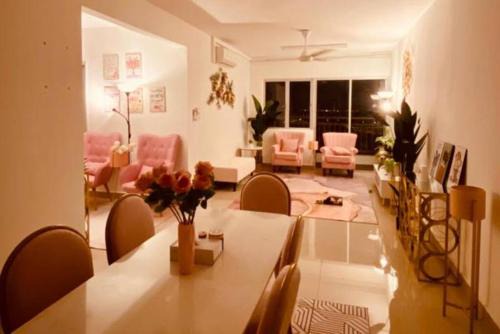 Ijok Apartment | Inviting Sentrovue B Pink House: Pool & Family-Friendly Stay