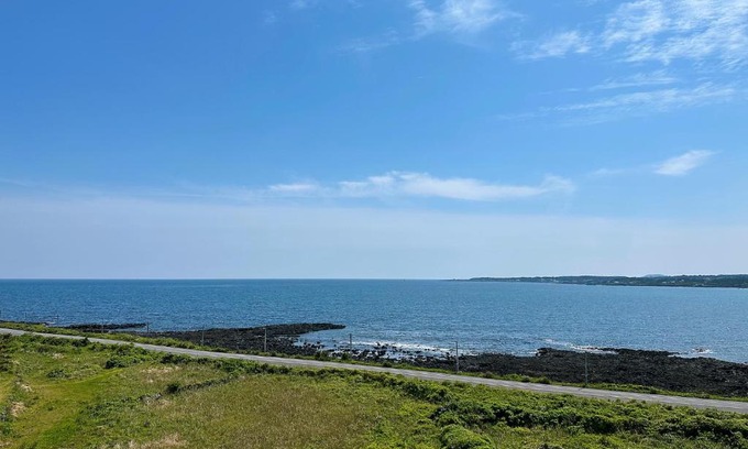 Seongsan Apartment | Eco-Friendly Seopjikoji Oceanview Apartment with Hot Tub