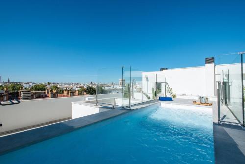 San Gil Apartment | Experience Sercotel Sevilla Guadalquivir Suites: 4-Star Comfort